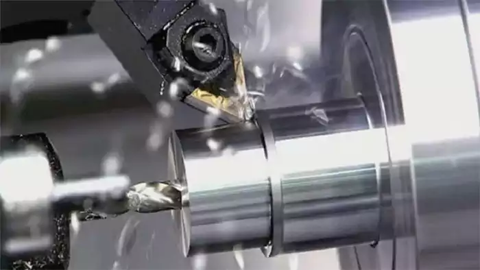 Close-up of CNC cutting tool operations