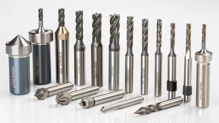 Assortment of CNC router bits for wood: end mills, V-bits, ball nose bits