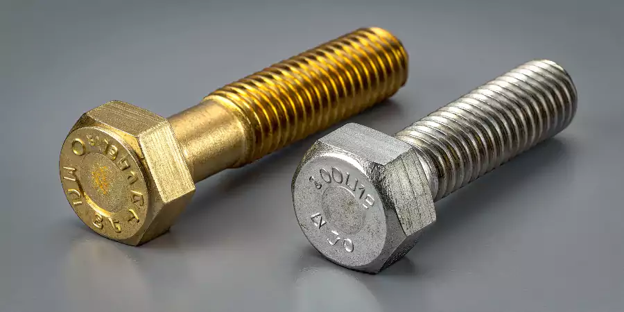 An image of a high-strength Grade 8 bolt next to a standard bolt, showing the head markings