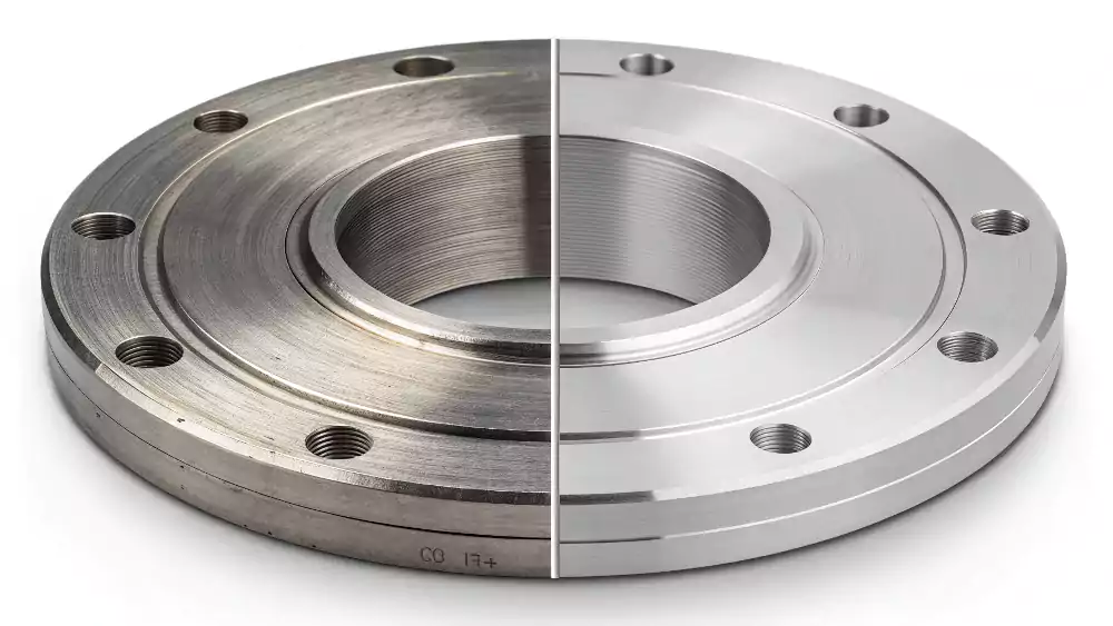 A machined aluminum part where half is raw and shows tool marks, and the other half has a clean, uniform bead blast finish