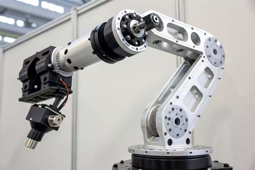A high-precision, complex robotic arm joint made from anodized aluminum