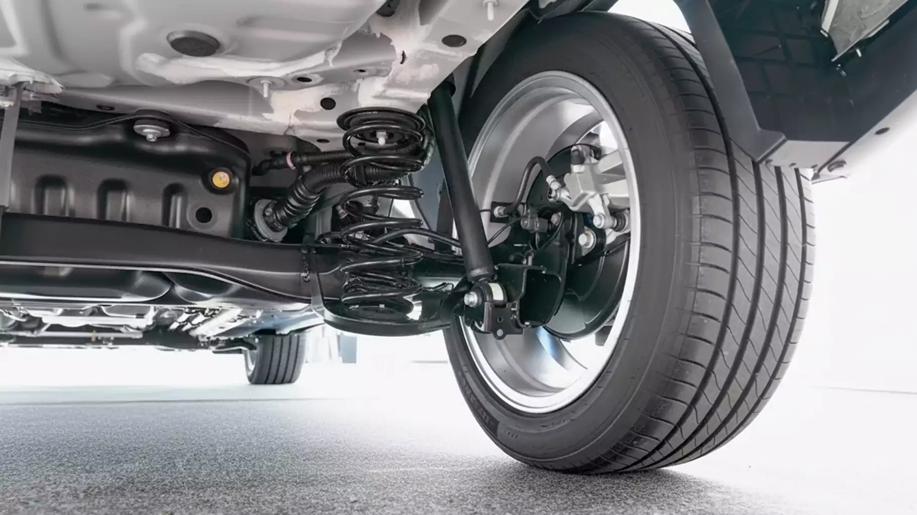 modern vehicle suspension system improving ride comfort and steering stability